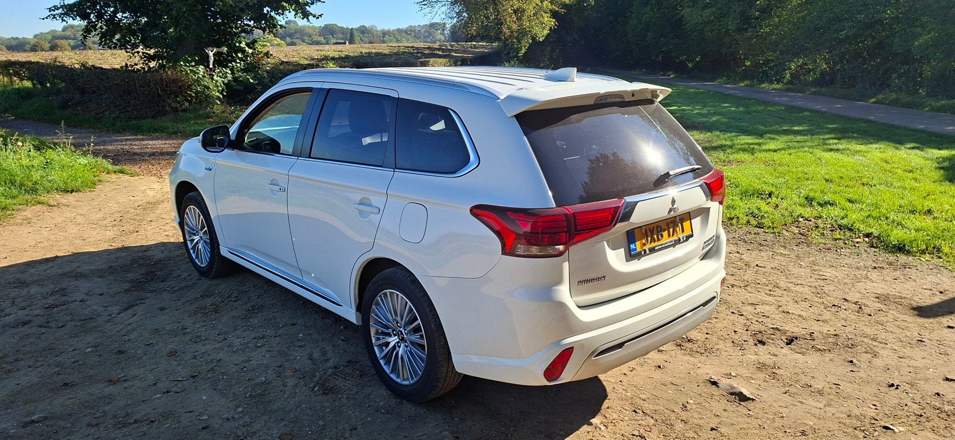 Mitsubishi Outlander 2.4 PHEV S-Edition BOVAG - Apple Carpla, Auto's, Dealer onderhouden, 135 pk, 4 cilinders, Alcantara