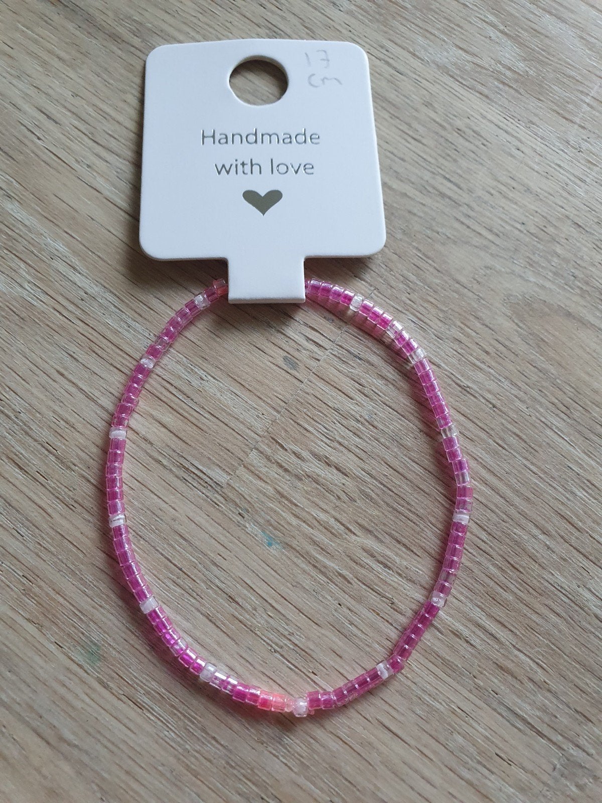 Elastisch armbandje 17 cm - Steun Run for Kika, Sieraden, Tassen en Uiterlijk, Nieuw, Ophalen of Verzenden, Elastiek, Roze