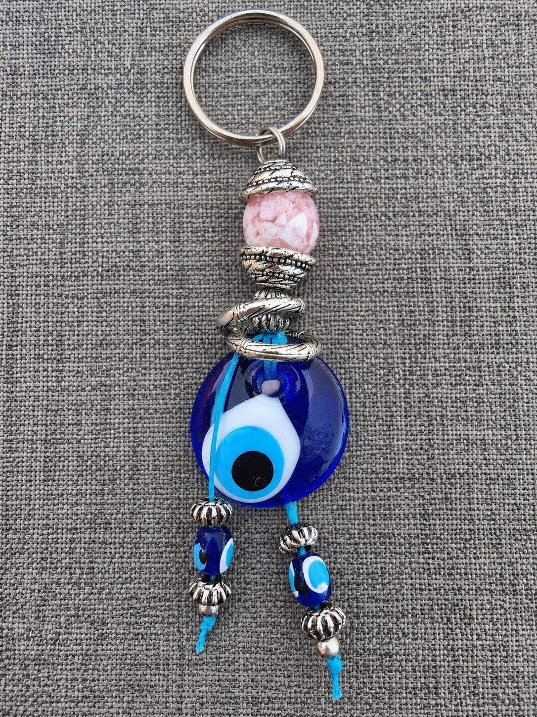Vintage blauwe Nazar oog sleutelhanger met kralen en bedels, Ophalen of Verzenden, Gebruikt