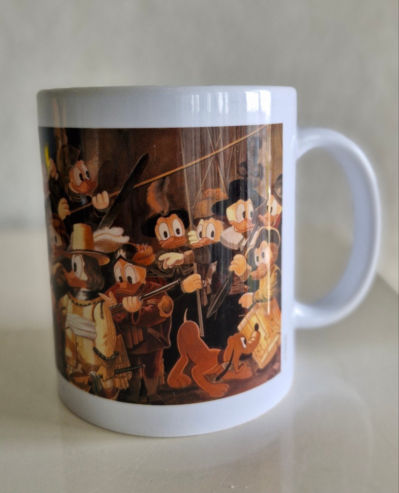 Beker Donald Duck Nachtwacht, Ophalen of Verzenden, Zo goed als nieuw, Overige stijlen, Kop(pen) en/of Schotel(s)