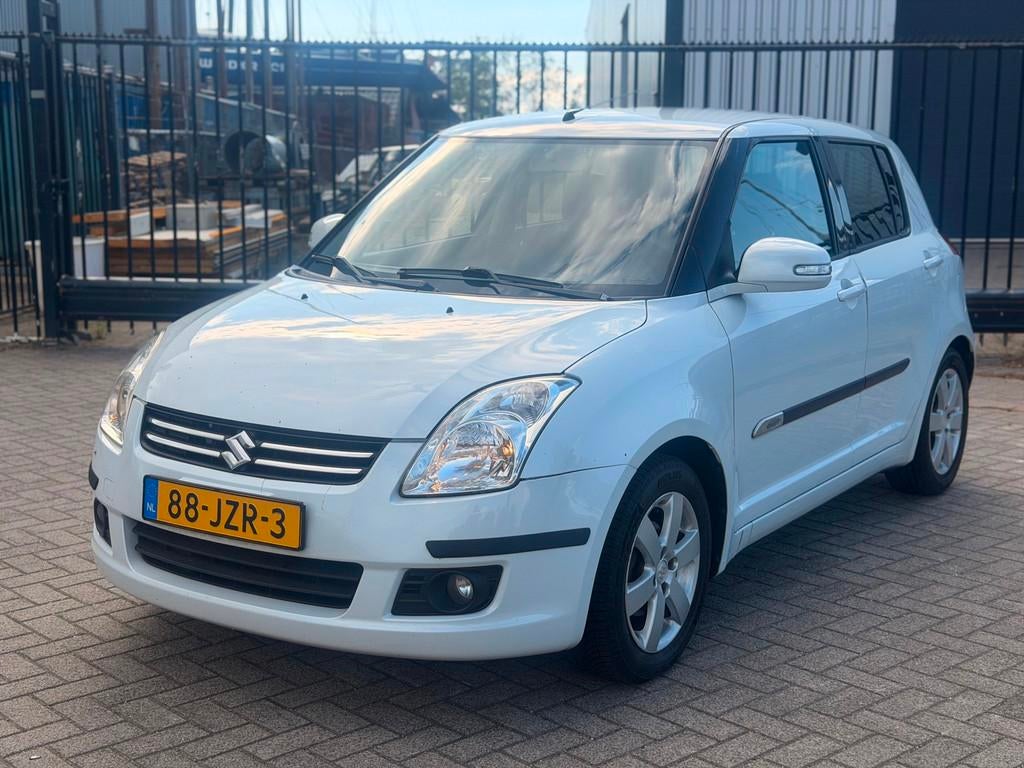 Suzuki Swift 1.3 Limited Lpg G3 Airco Navi Camera 5 Deurs, Auto's, Suzuki, Voorwielaandrijving, 989 kg, 400 kg, Alcantara