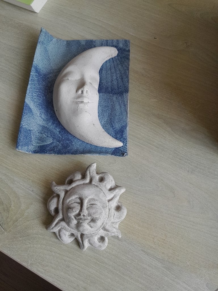 betonnen zon en maan, Ophalen