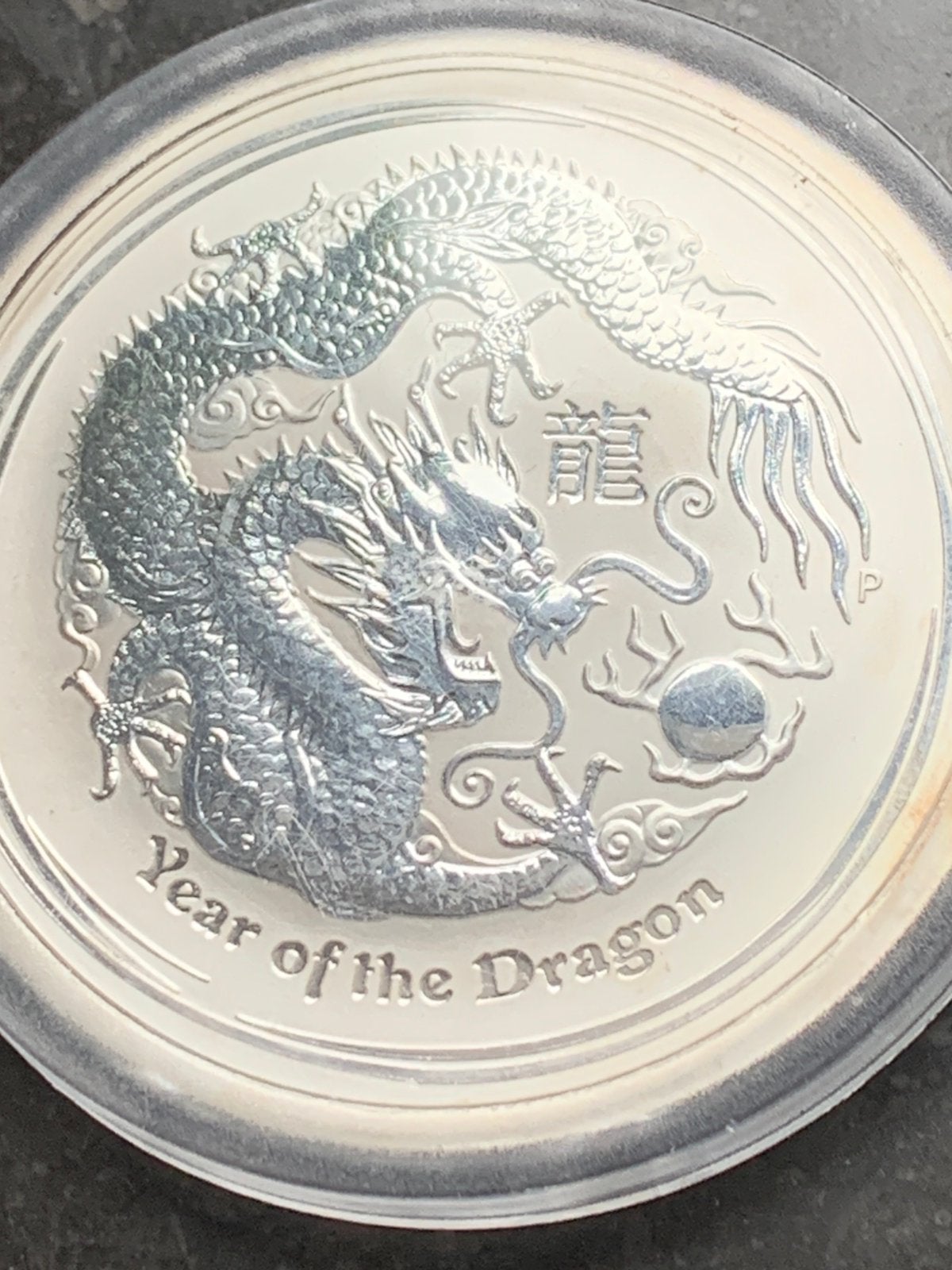 Prachtige zilveren munt 2 oz year of the dragon 2012 schaars, Ophalen of Verzenden, Zilver
