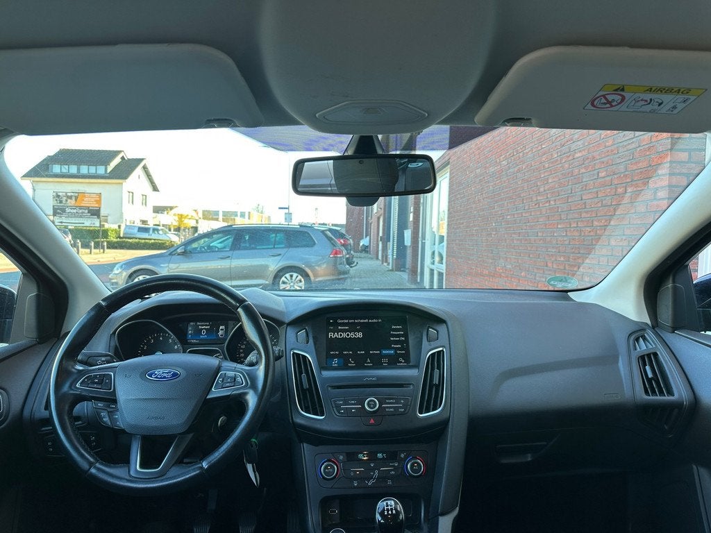 Ford Focus Wagon 1.0 Lease Edition / Navi / Carplay / PDC /, Gebruikt, Met garantie (alle), Zwart, Origineel Nederlands