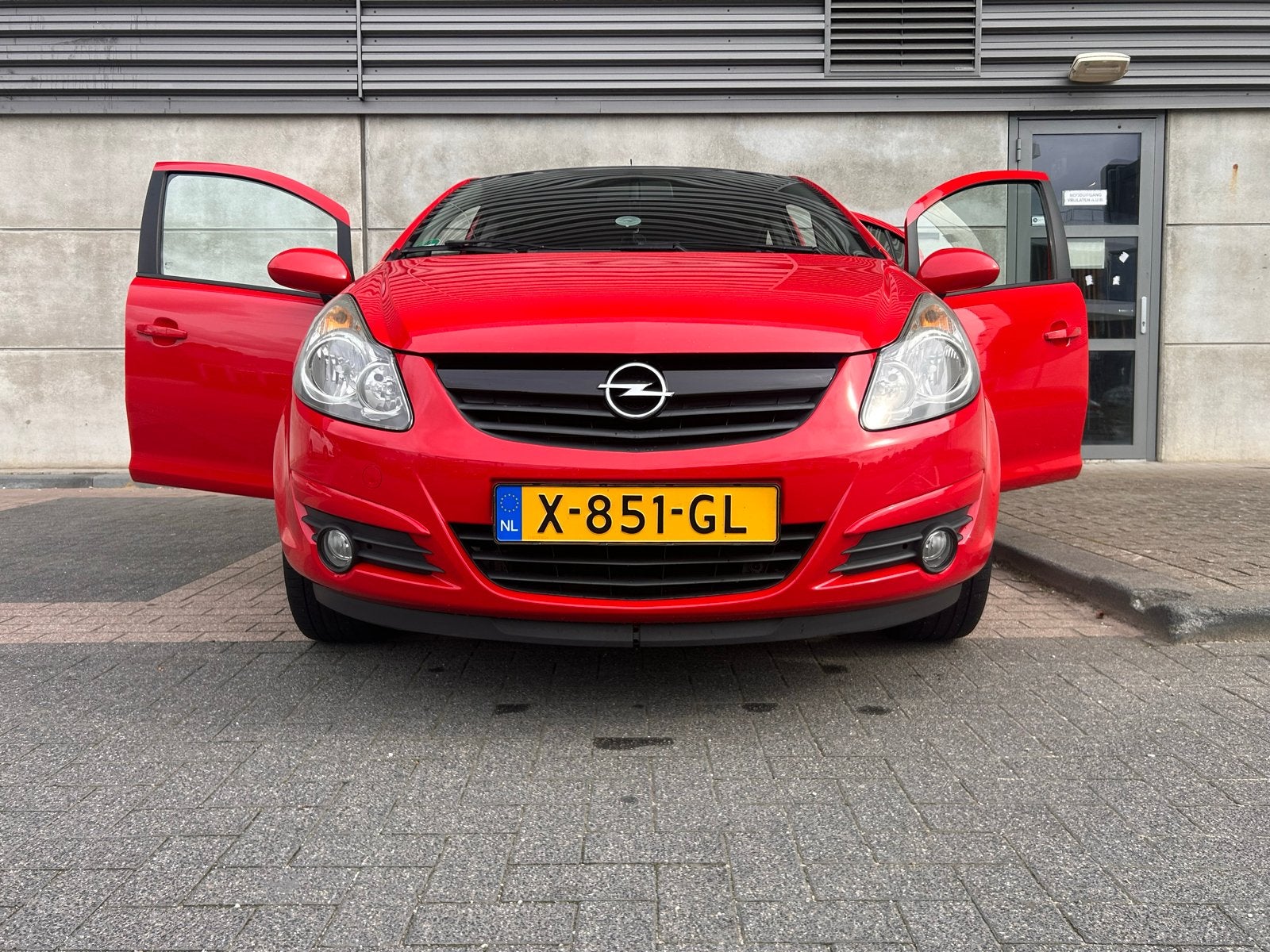 Opel Corsa 1.4 16V 5D 2010 Rood, Auto's, Opel, Voorwielaandrijving, 1063 kg, 1398 cc, 4 cilinders