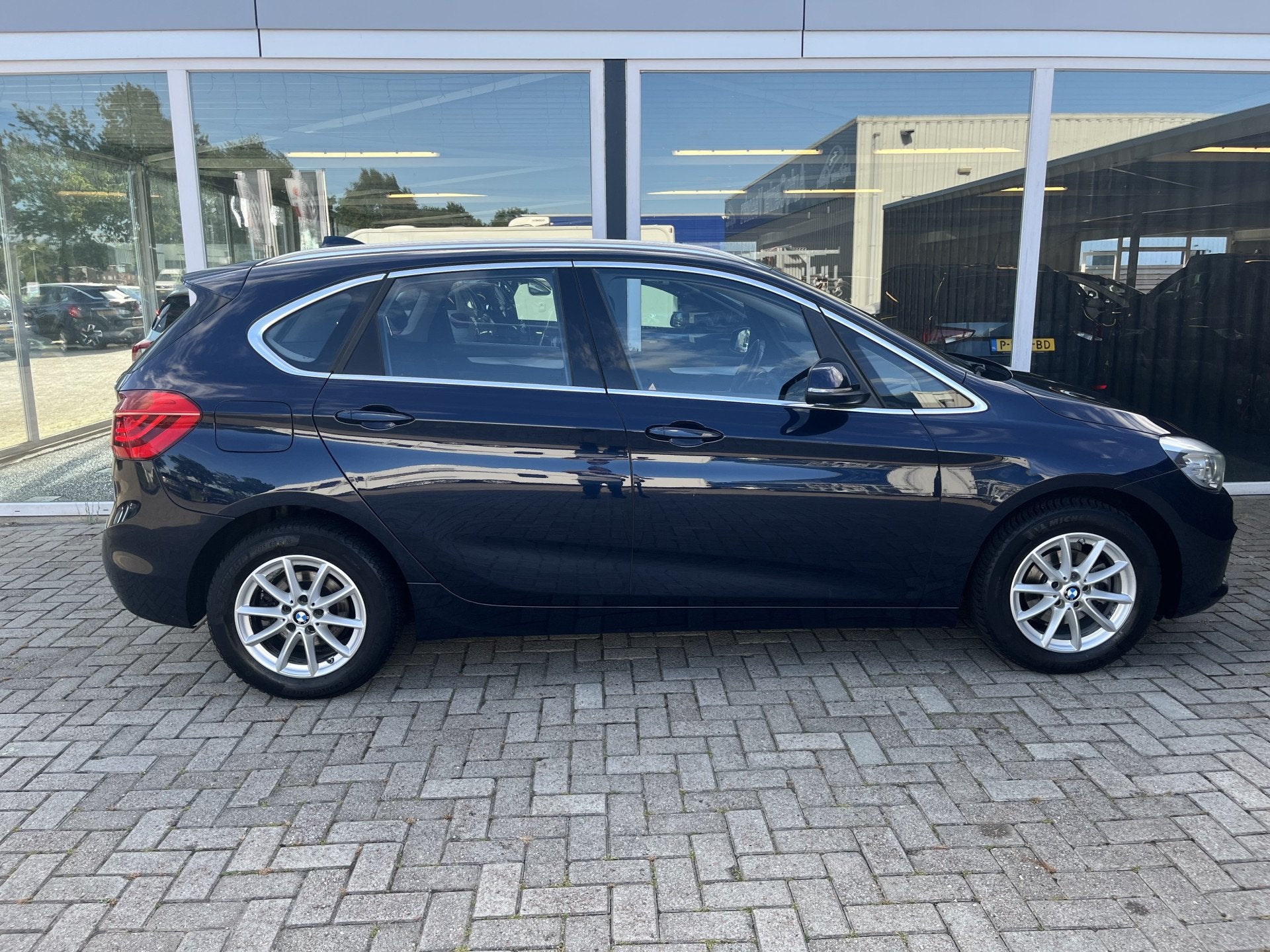 BMW 2 Serie Active Tourer 216i Centennial Executive, Auto's, Voorwielaandrijving, Stof, Gebruikt, Blauw
