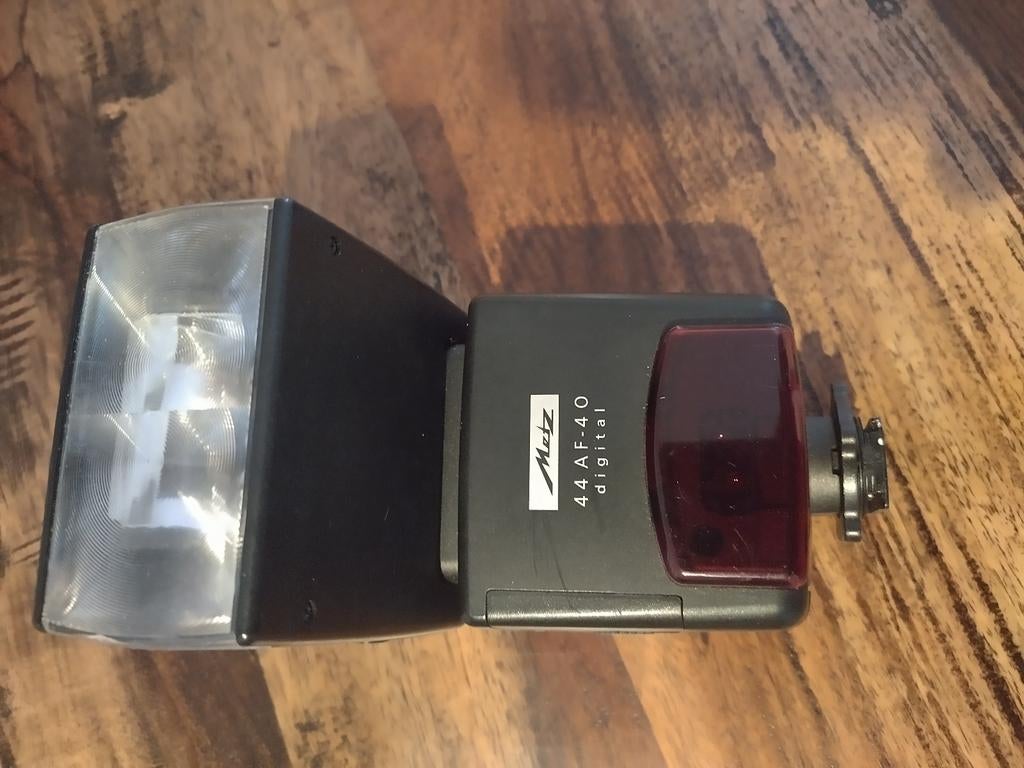 Metz Mecablitz 44 AF-4 Digital flitser voor Olympus, Ophalen of Verzenden, Zo goed als nieuw, Metz, Kantelbaar