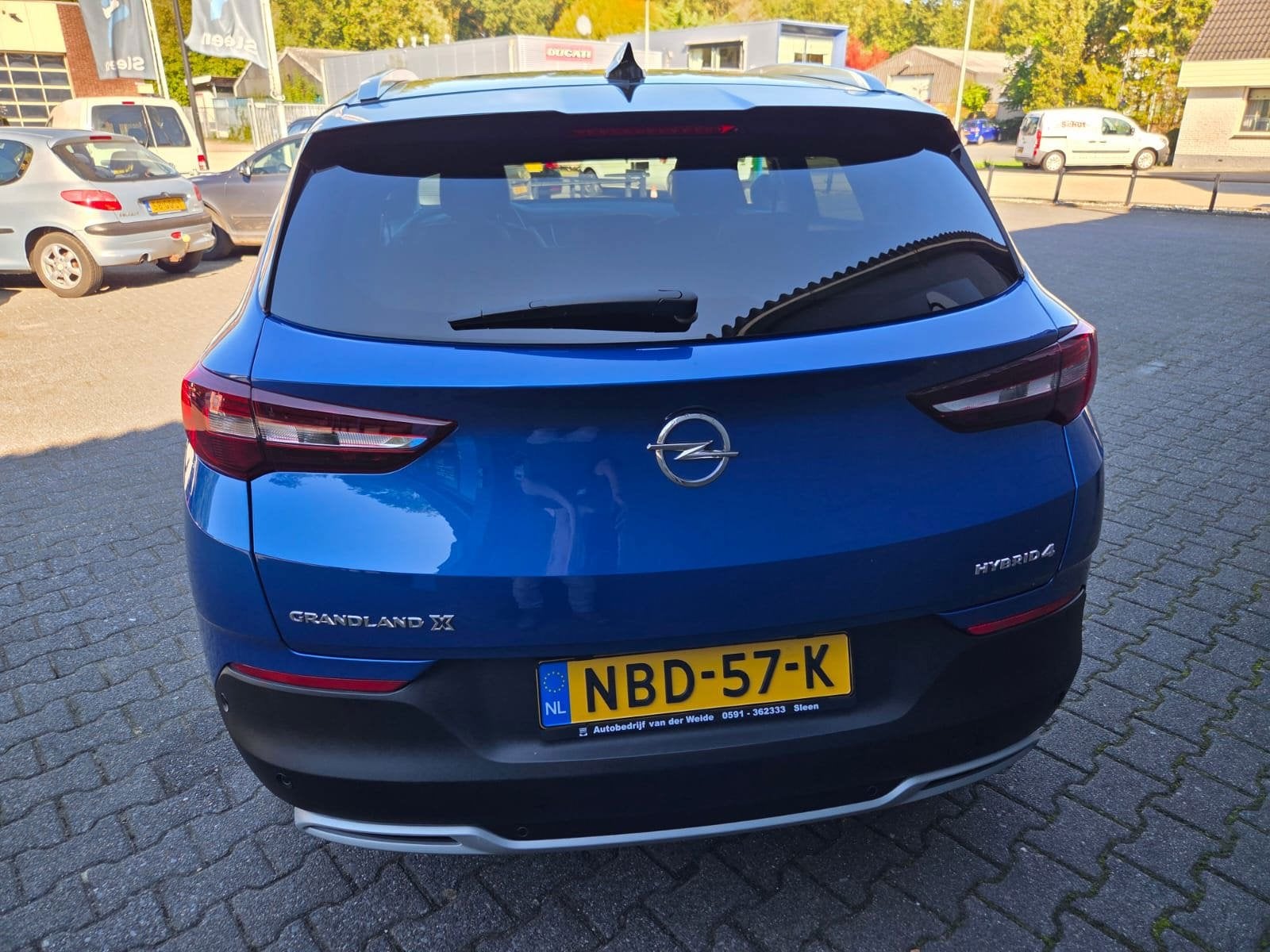 Opel GRANDLAND X 1.6 Turbo Hybrid4 Business Executive, Auto's, Automaat, Dealer onderhouden, 77 km/l, 4 cilinders