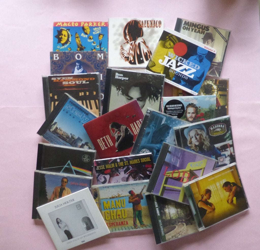 Foto 2 van Te koop rock, jazz, indie, world CD's, bladen, posters!
