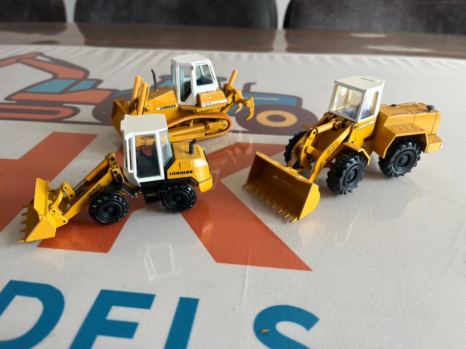 Trio Liebherr modelen loader bulldozer Conrad, Ophalen of Verzenden, Gebruikt, Hijskraan, Tractor of Landbouw, Conrad