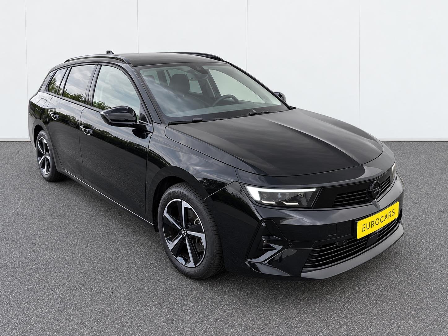 Opel Astra Sports Tourer 1.2 Turbo Ultimate Panoramadak Navi, Auto's, Opel, Stof, 1199 cc, Zwart, 3 cilinders