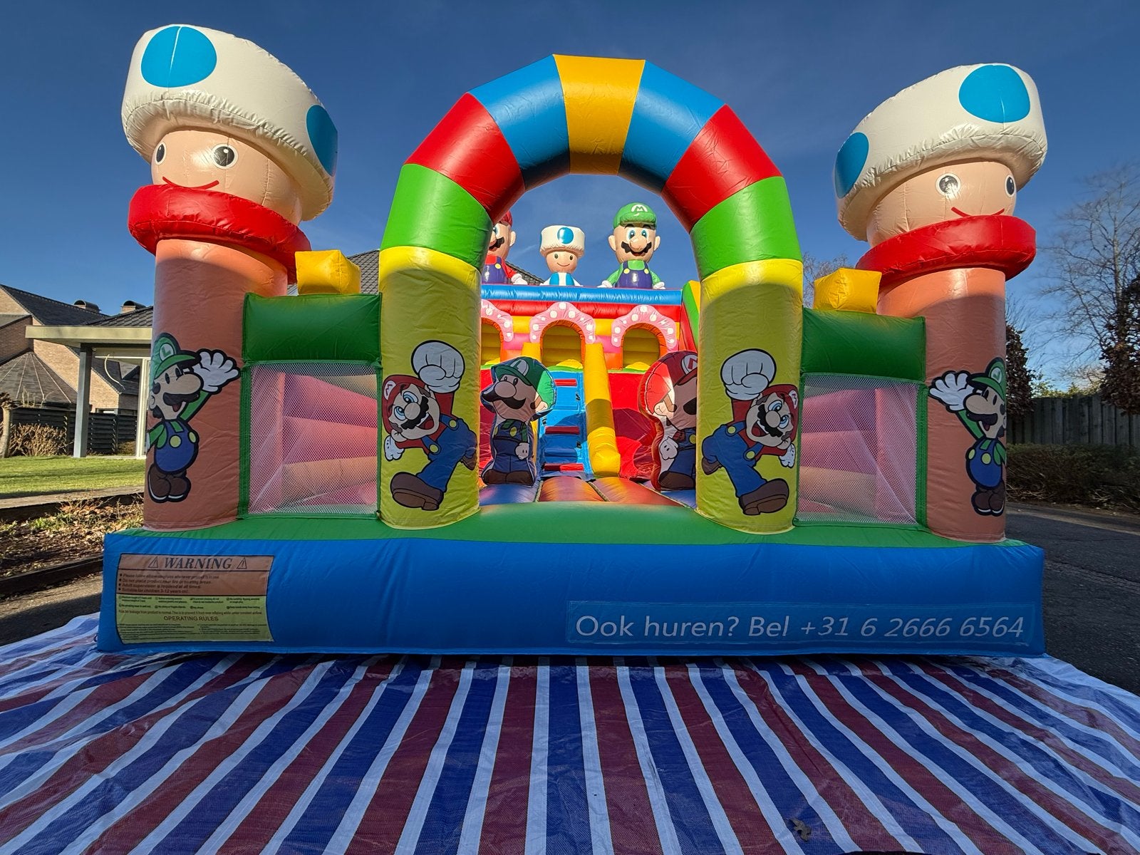 Springkussen Mario Bros - Huur per dag, Ophalen of Verzenden, Gebruikt