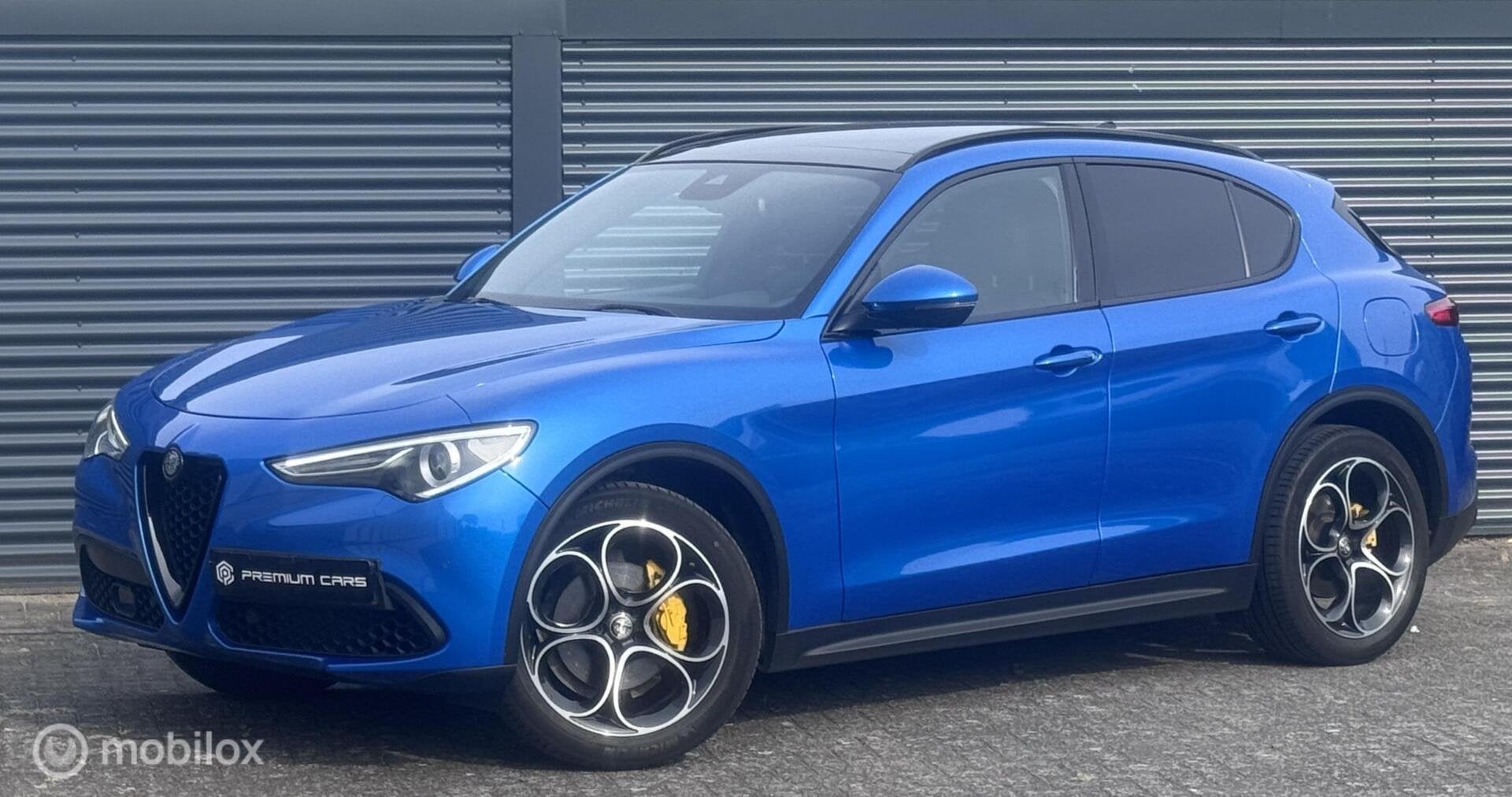 Alfa Romeo Stelvio 2.0 T AWD 280pk Pano Acc Trekhaak, Auto's, Automaat, Dealer onderhouden, 4 cilinders, Blauw