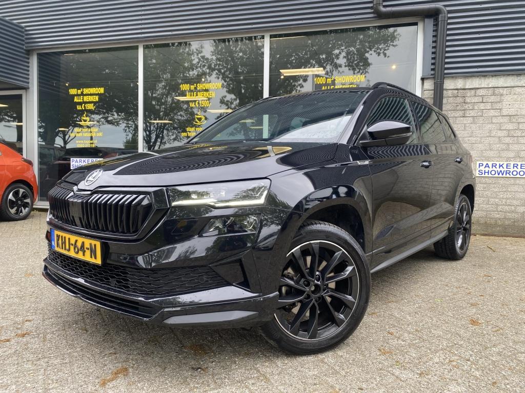 Skoda Karoq 1.5 TSI Sportline Business (bj 2022, automaat), Auto's, Skoda, Automaat, Euro 6, 4 cilinders, Automatische klimaatregeling