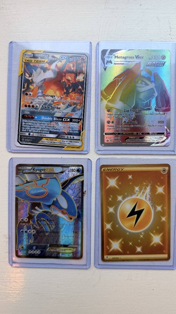 4 Pokémon: Charizard, Kyogre, Metagross & Gold Energy, Ophalen of Verzenden, Zo goed als nieuw, Meerdere kaarten, Foil