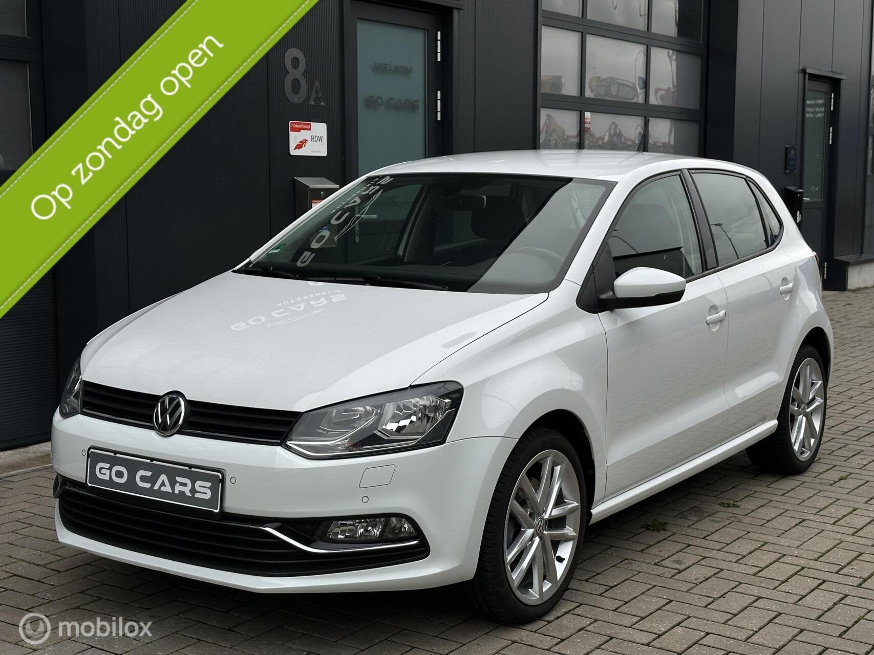 Volkswagen Polo 1.2 TSI BlueMotion Highline versnellingen 6, Auto's, Stof, Gebruikt, Zwart, 4 cilinders