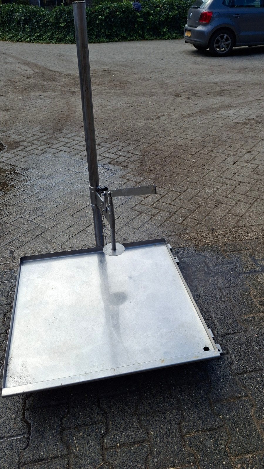 Kaaspers roestvrijstalen, Ophalen