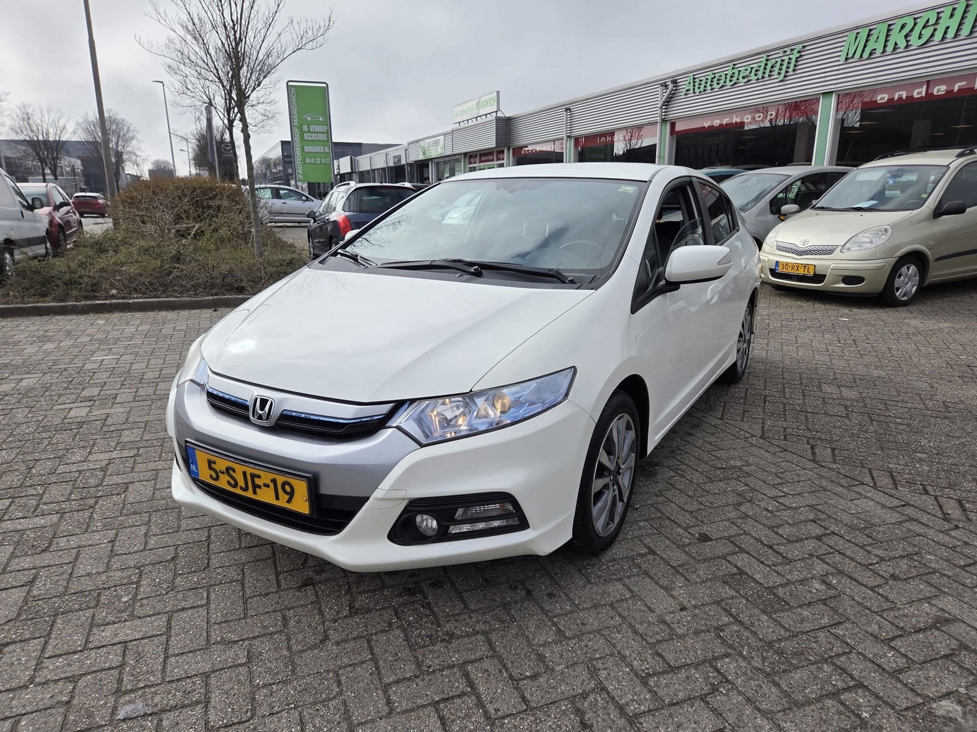 Honda Insight 1.3 Exclusive /HYBRIDE/Automaat/Clima/Cruise/L, Auto's, Honda, Gebruikt, 4 cilinders, Leder en Stof, Bedrijf