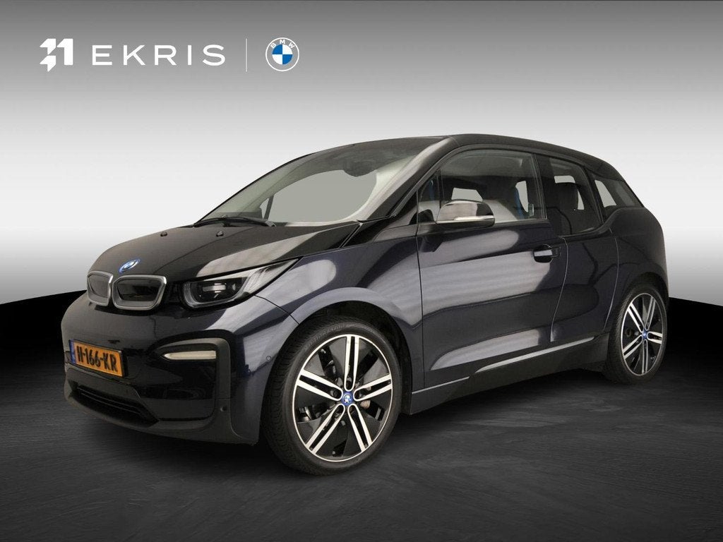 BMW i3 Executive Edition 120Ah 42 kWh LED | Navigatie | Stoe, Auto's, BMW, Automaat, 12 maanden, Gebruikt, Grijs