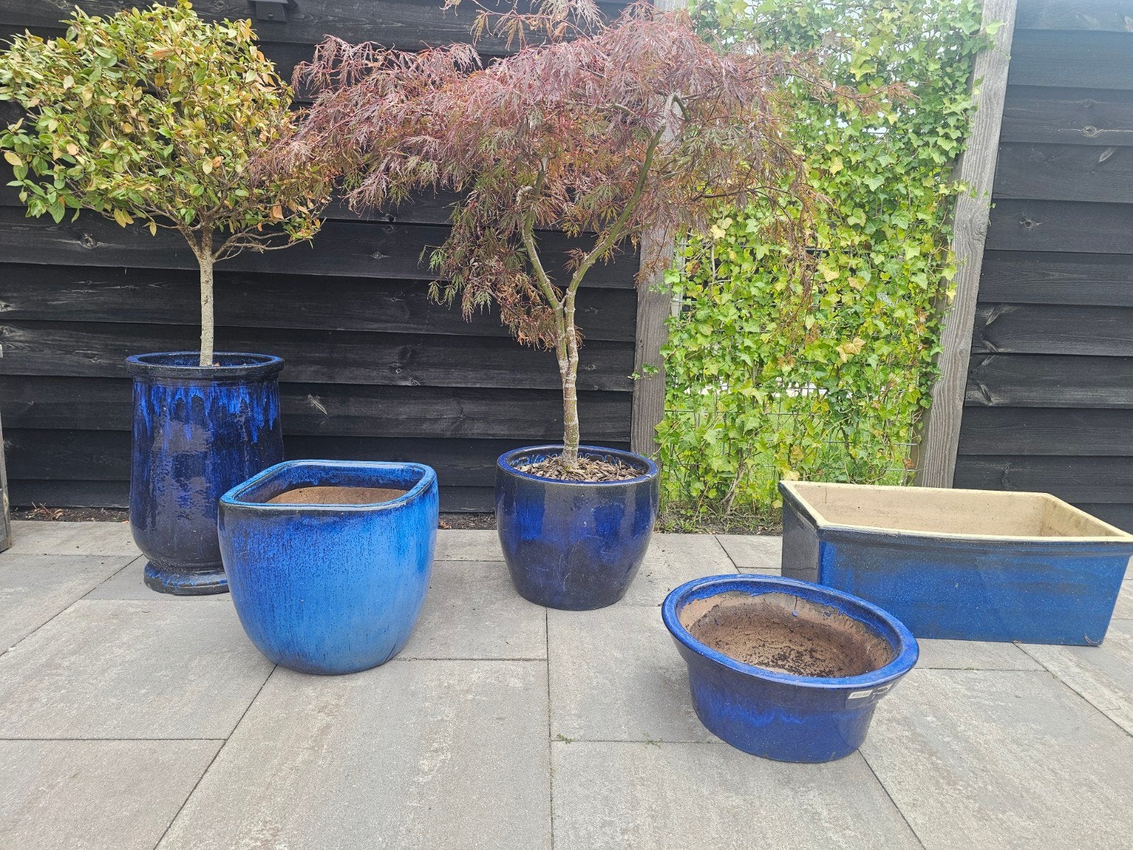 grote Blauwe bloempotten in zeer goede staat, Tuin en Terras, Steen, Minder dan 30 cm, Rond, Ophalen of Verzenden
