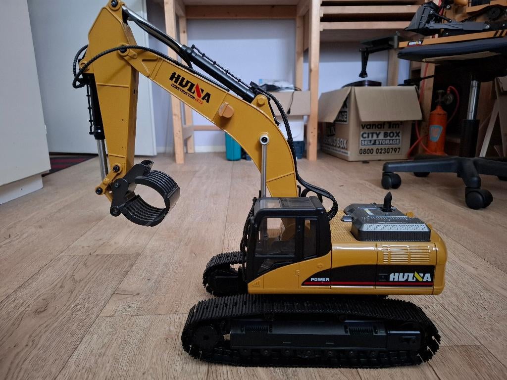 Huina professional excavator model, Elektro, Schaal 1:14, Ophalen of Verzenden, Zo goed als nieuw