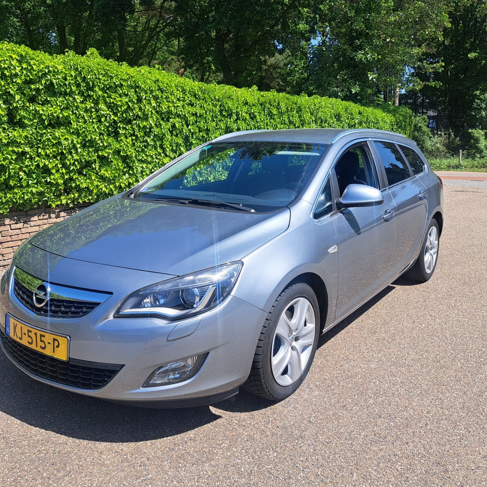 Opel Astra 2.0CDTI Ecotec 121KW Sp.t.at 2012 Grijs, Metallic lak, 4 cilinders, Stationwagon, Diesel