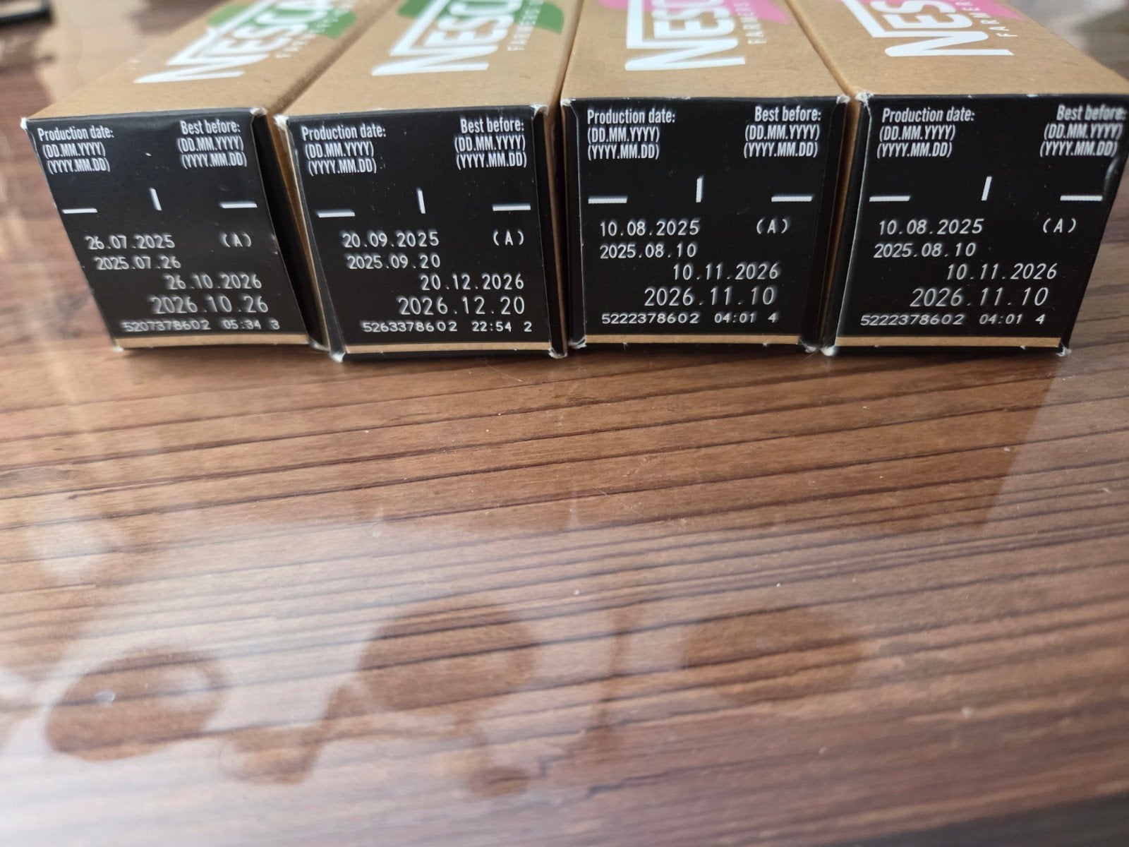 Foto 4 van Cuphouder met Nescafé cups en diverse losse cups