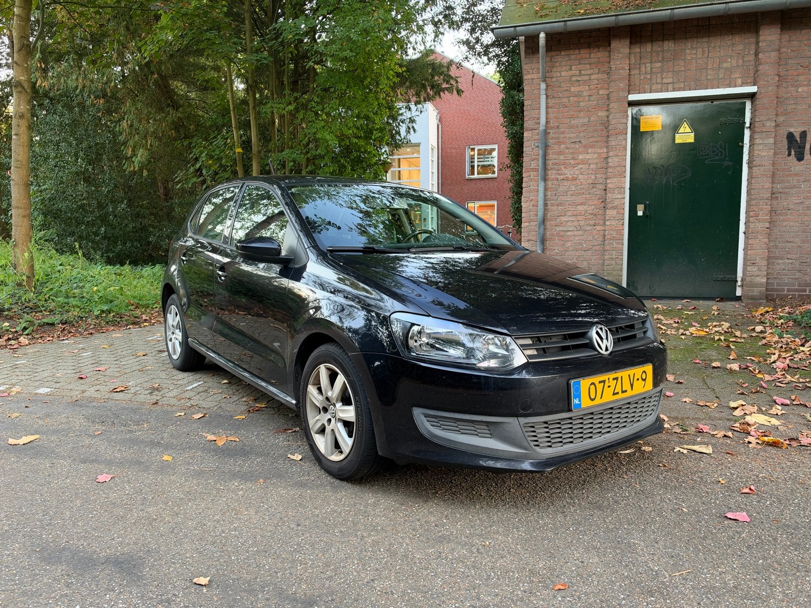Volkswagen Polo 1.2 51KW 2011 Zwart, Auto's, Voorwielaandrijving, 40 €/maand, 1198 cc, Zwart
