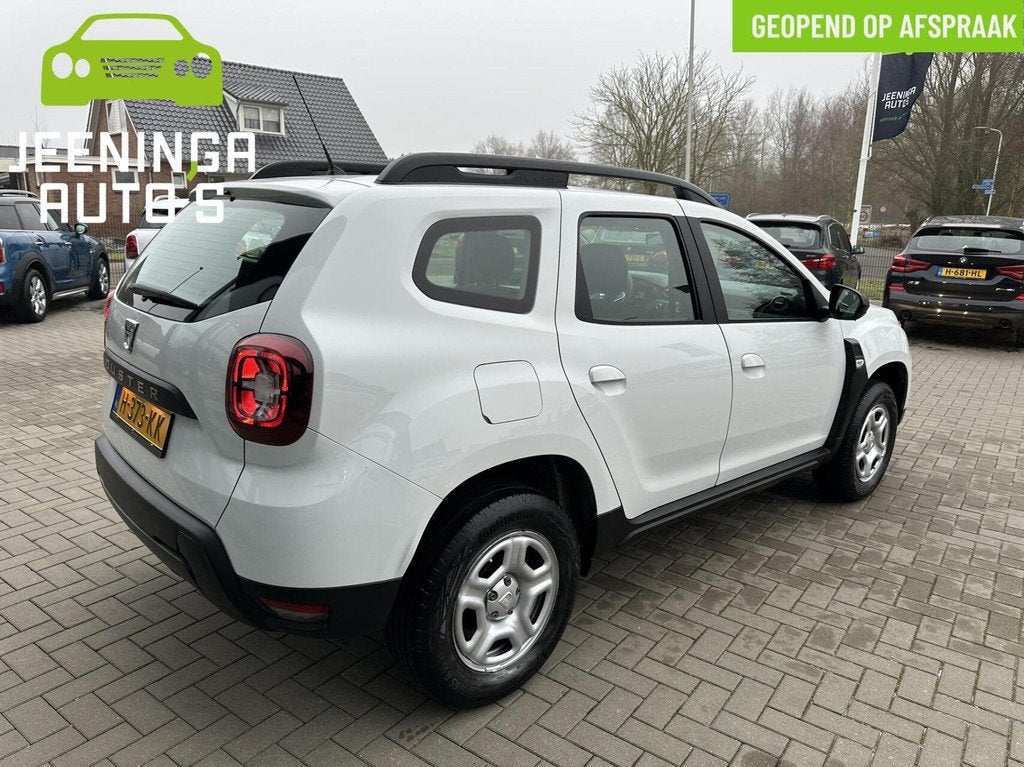 Dacia Duster TCe 100 Comfort|Airco, Auto's, Dacia, Gebruikt, 4 cilinders, Duster, Wit