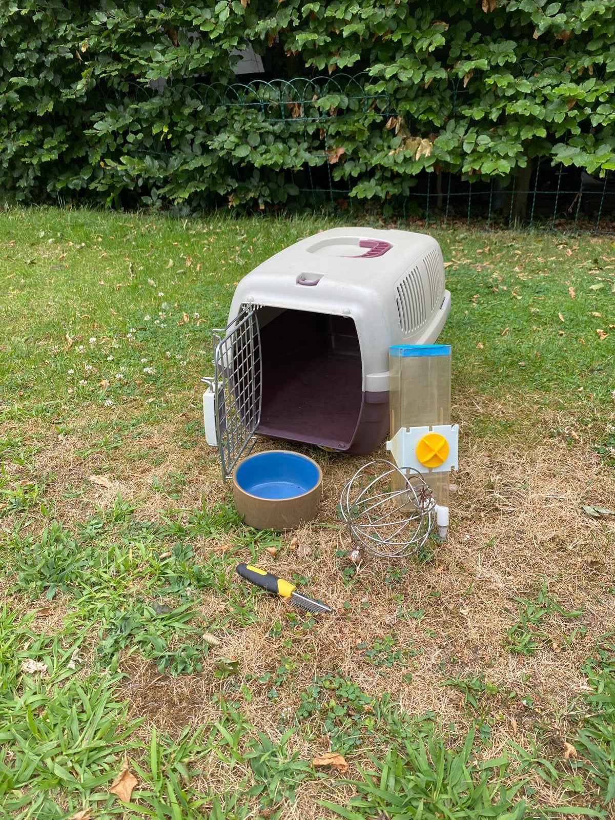 Reiskooi voor kleine dieren met wat accessoires, Ophalen
