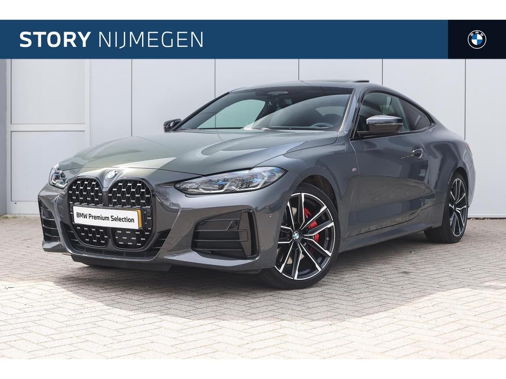 BMW 4 Serie Coupé M440i xDrive High Executive M Sport Autom, Auto's, BMW, Open dak, Euro 6, Met garantie (alle), 4 stoelen