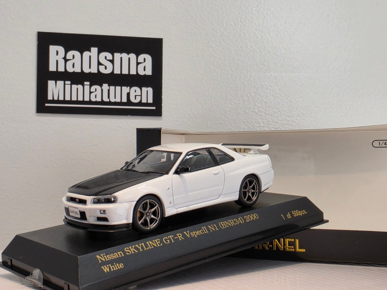 Nissan Skyline GT-R R34 - White/black - 1:43 Car-Nel, Hobby en Vrije tijd, Overige merken, Auto, Nieuw, Ophalen of Verzenden