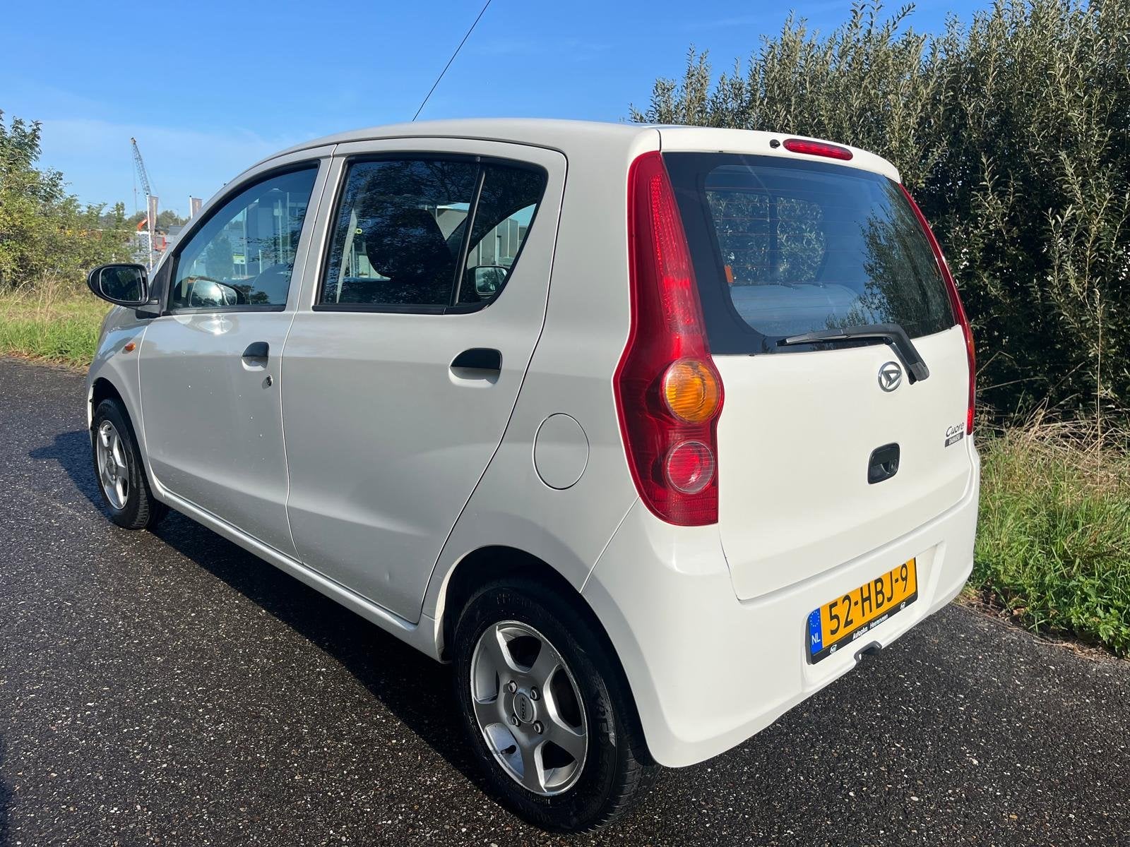 Daihatsu Cuore 1.0 | 5 drs | APK september 2027, Auto's, Daihatsu, Voorwielaandrijving, 18 €/maand, ABS, 4 stoelen