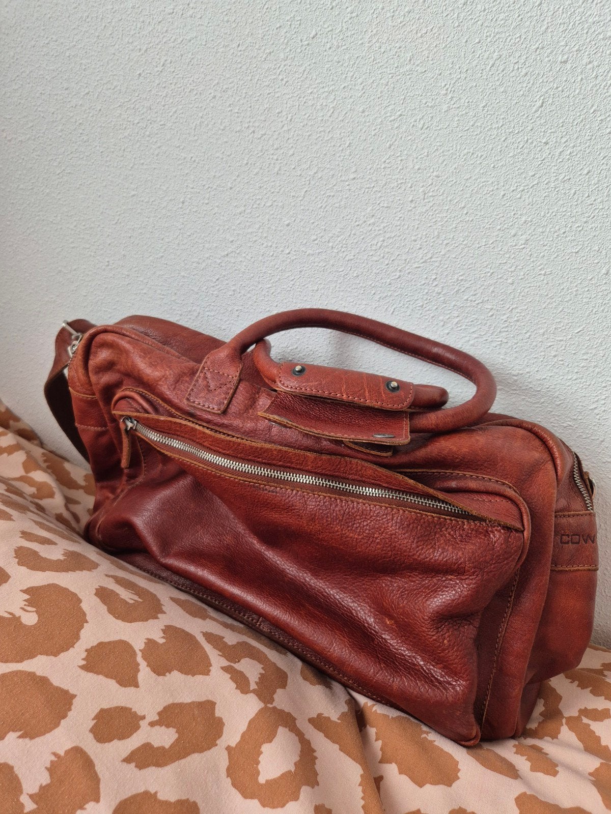 Leren Cowboybag laptoptas, Ophalen