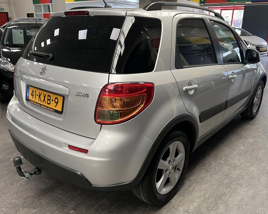 Suzuki SX4 1.6 Shogun - 2e eigenaar -NAP -NAV - Airco - Crui, Gebruikt, Zwart, 4 cilinders, 49 €/maand