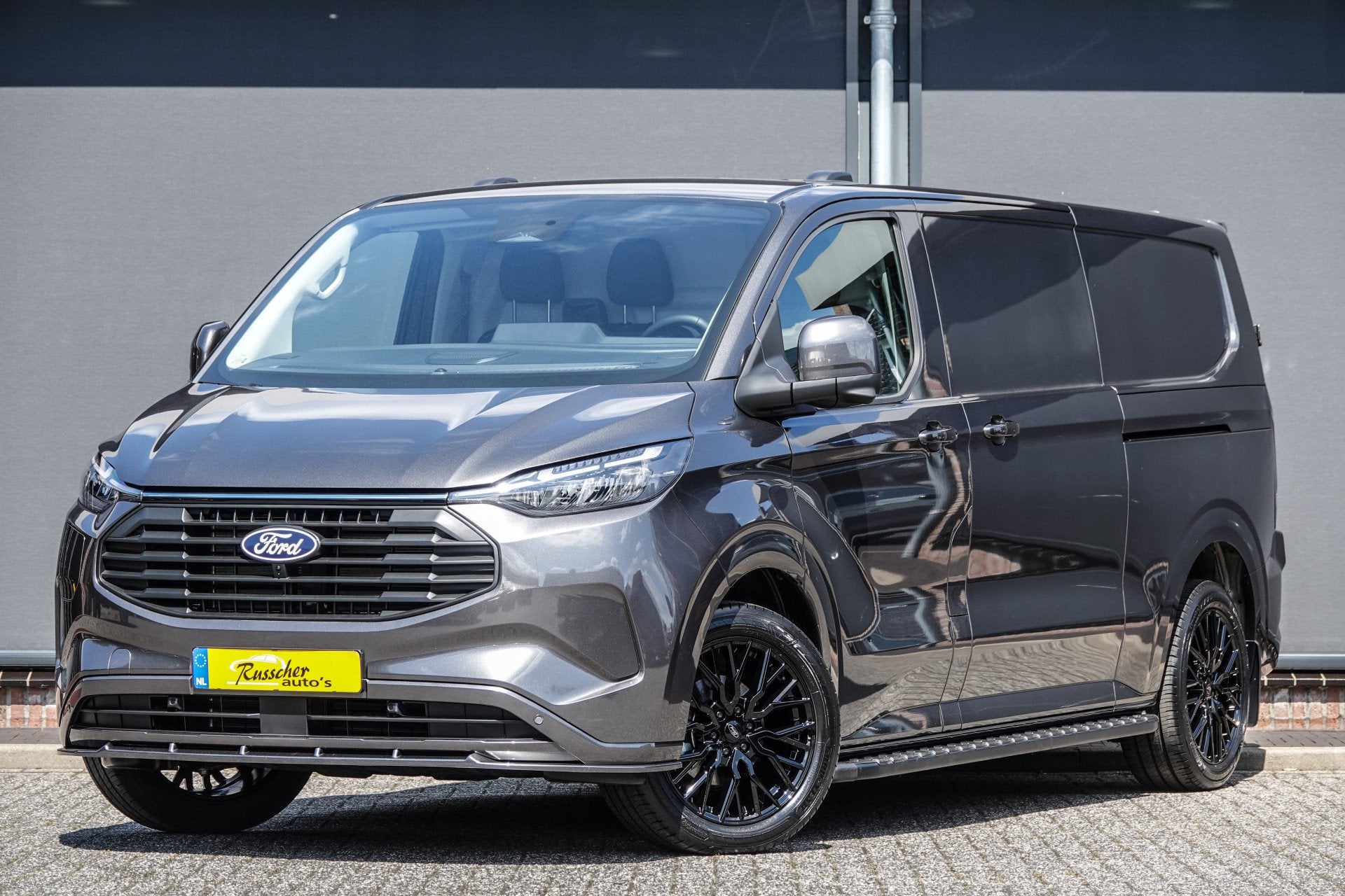 Ford Transit Custom L2H1 2.5PHEV 233Pk Aut. | Limited | Plug, Auto's, Stof, Gebruikt, Zwart, 4 cilinders