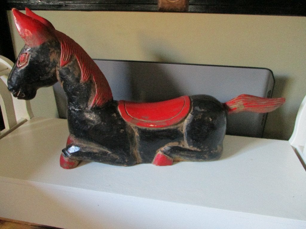 Oud houten paard, Ophalen