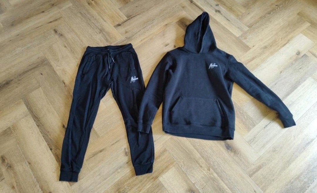 malelions pak xl, Zwart, Maat 56/58 (XL), Ophalen of Verzenden, Zo goed als nieuw