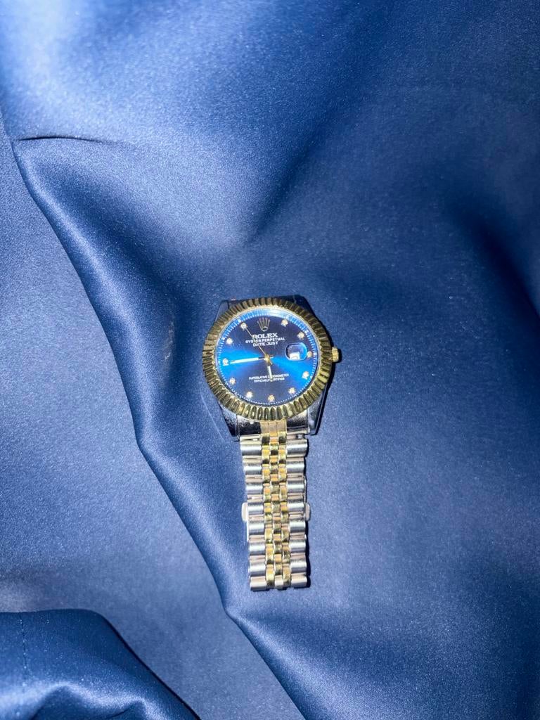 Herenhorloge met blauwe wijzerplaat en goudkleurige rand, Overige merken, Staal, Polshorloge, Nieuw