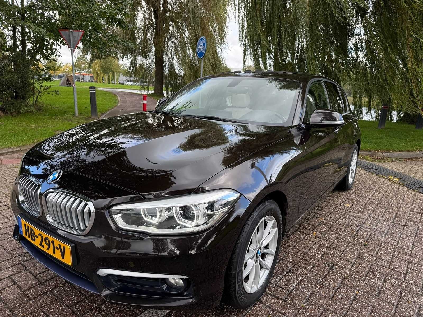 BMW 1-serie 118i EDE C. Urban * HB-291-V, Auto's, Gebruikt, Bruin, Origineel Nederlands, 650 kg