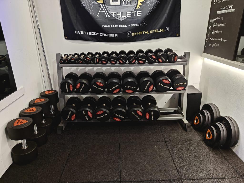 Hastings dumbbellset 1-40 kg incl rekken - nieuwstaat, Hastings, Hastings, Ophalen of Verzenden, Zo goed als nieuw
