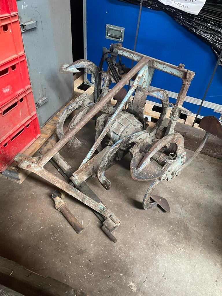 Spitmachine roterend spitter, Ophalen