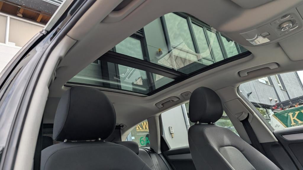 Audi A4 Avant 1.8 TFSI 125kW | Panoramadak | Cruise | Navi, Voorwielaandrijving, Zwart, 4 cilinders, Zwart