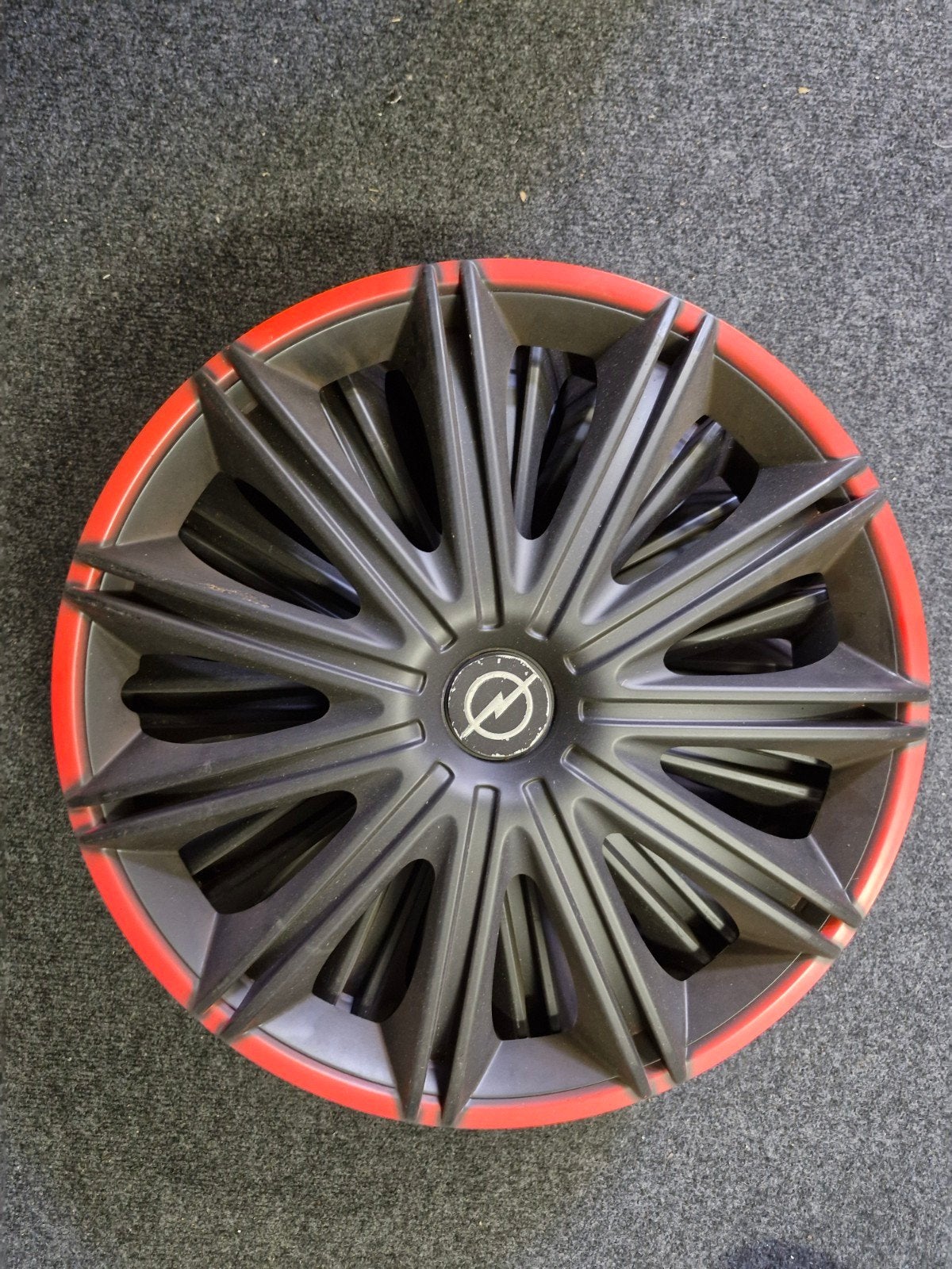 Opel wieldop zwart/rood, Auto diversen, Wieldoppen, Ophalen, Gebruikt