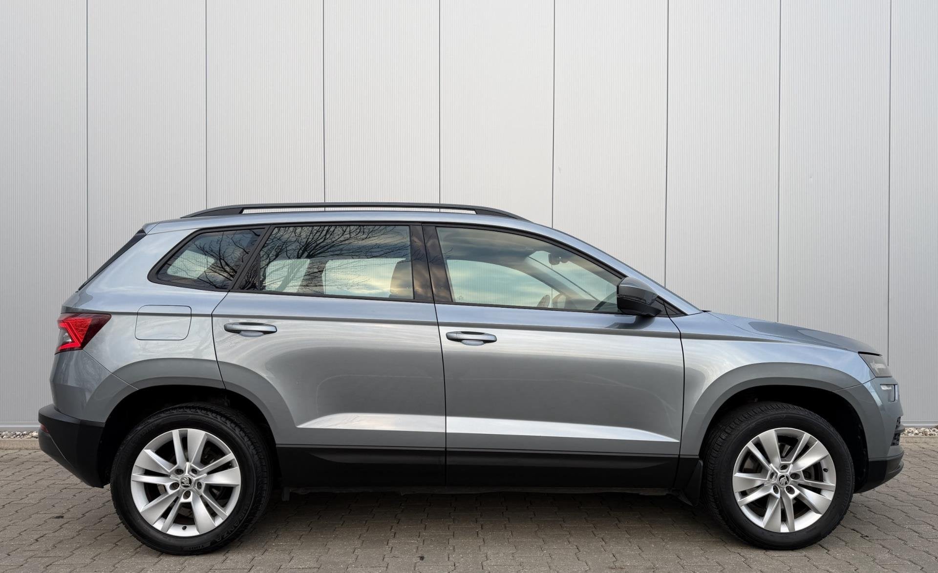 Skoda KAROQ 1.0 TSI Style 116PK Automaat | ACC | Camera |, Auto's, Stof, Gebruikt, 1261 kg, 116 pk