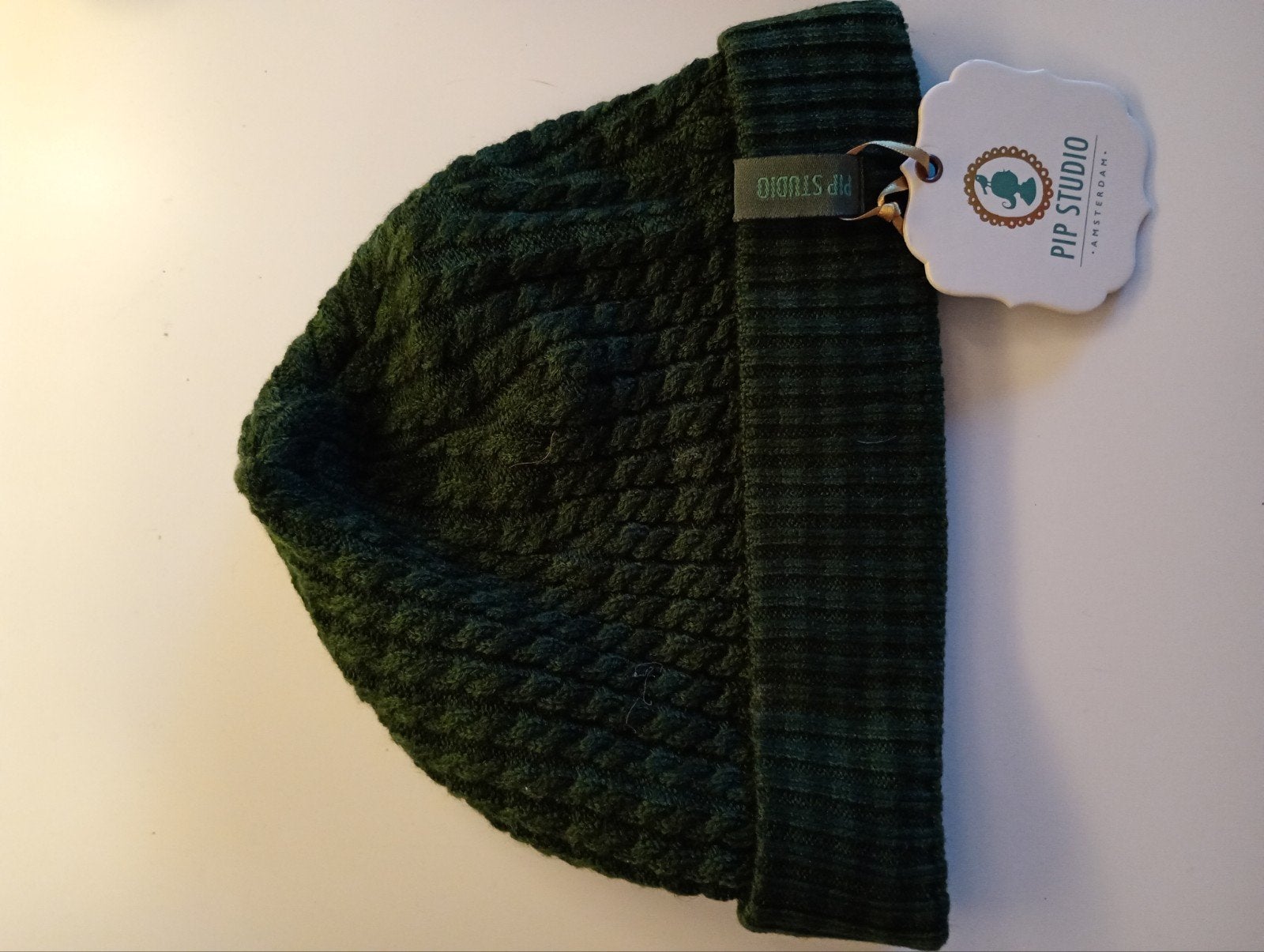 Nieuwe donkergroene gebreide muts voor kinderen/baby's, Kinderen en Baby's, Babykleding | Mutsen, Sjaals en Wanten, Ophalen, Pip Studio