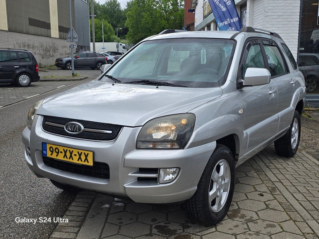 Kia Sportage 2.0 CVVT X-ecutive*2e eig*nap*apk*airco*trekhaa, Auto's, Kia, 1442 kg, Gebruikt, 4 cilinders, Automatische klimaatregeling