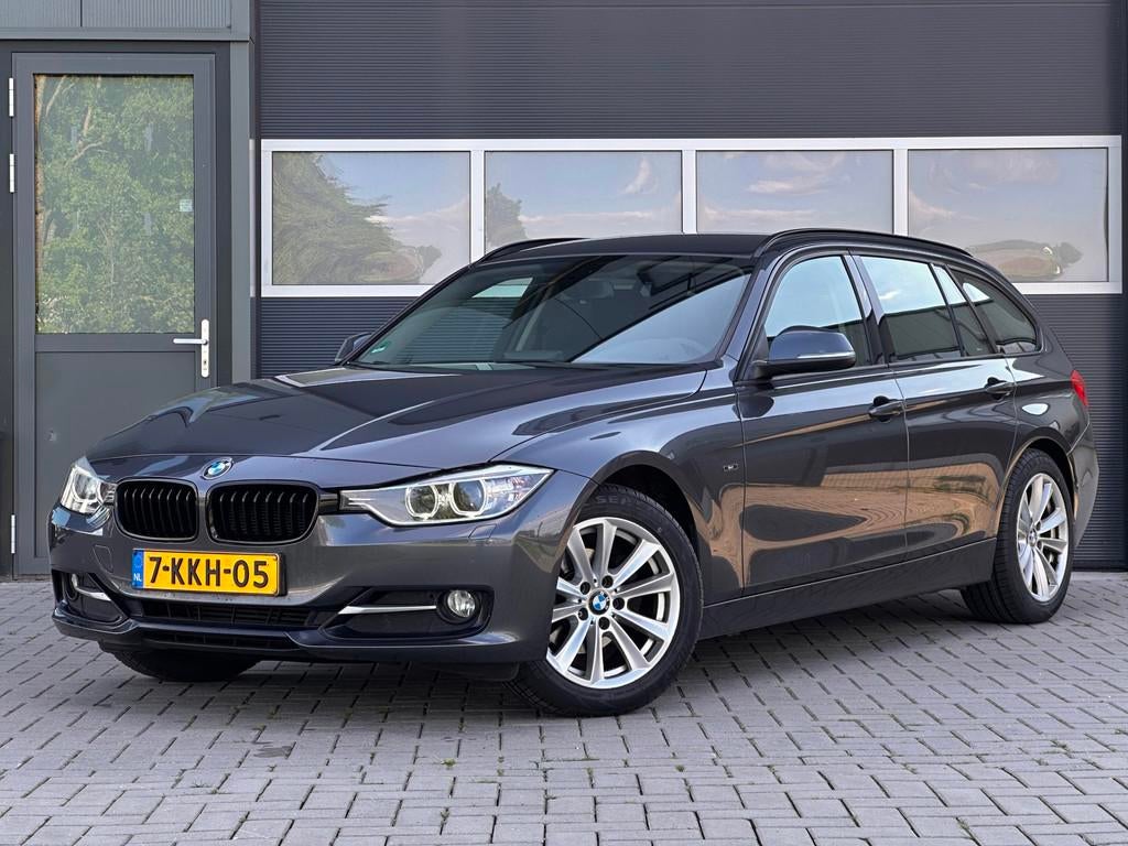 BMW 3-serie Touring 316i Sport Automaat Trekhaak Xenon, Auto's, Automaat, Gebruikt, 4 cilinders, Automatische klimaatregeling