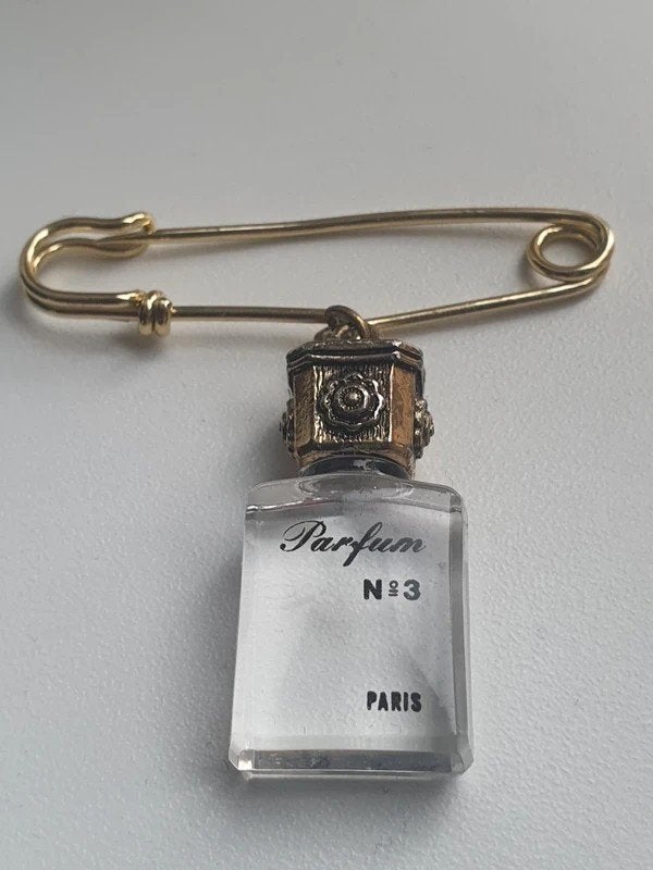 Vintage Broche Veiligheidsspeld Parfumflesje Paris No 3, Ophalen of Verzenden, Zo goed als nieuw, Goud, Overige materialen