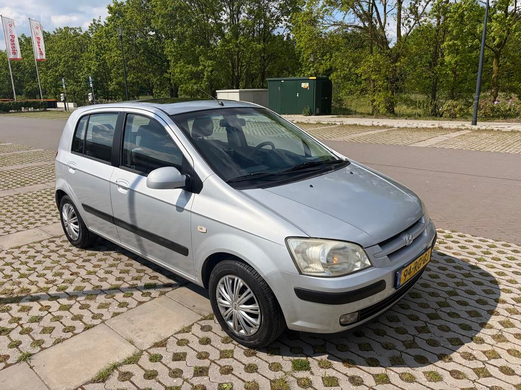 Hyundai Getz 1.3 5DRS 2005 Grijs, Auto's, Hyundai, Voorwielaandrijving, 40 €/maand, 4 cilinders, Origineel Nederlands